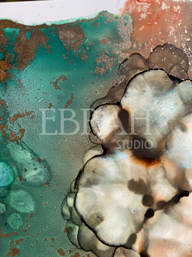 macro shot of alcohol ink blue bronze