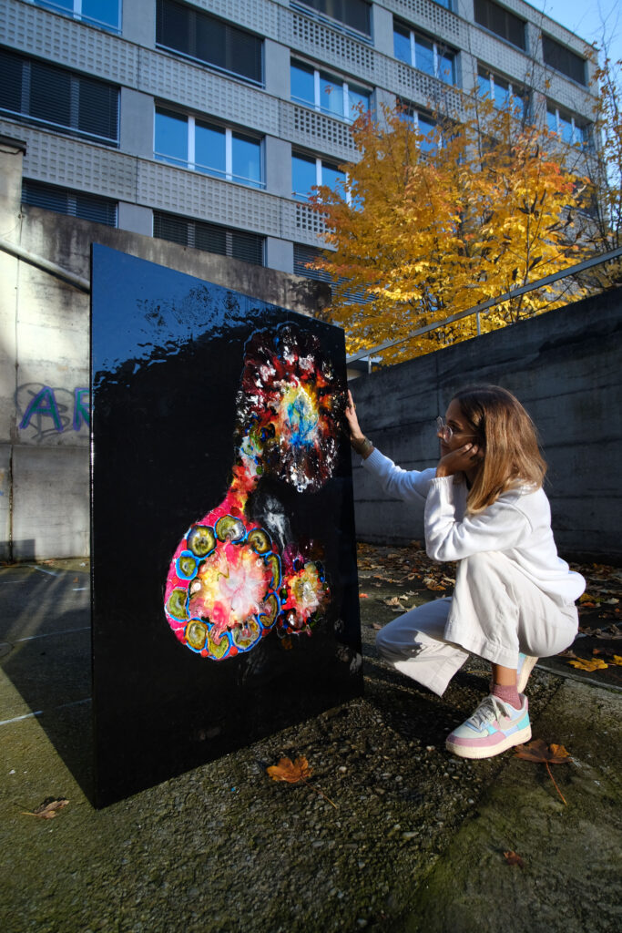 women with colorful artwork