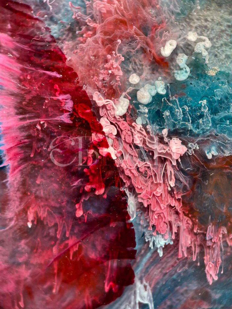 macro shot of alcohol ink pink and blue
