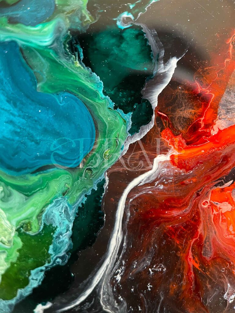 macro shot of alcohol ink blue green red